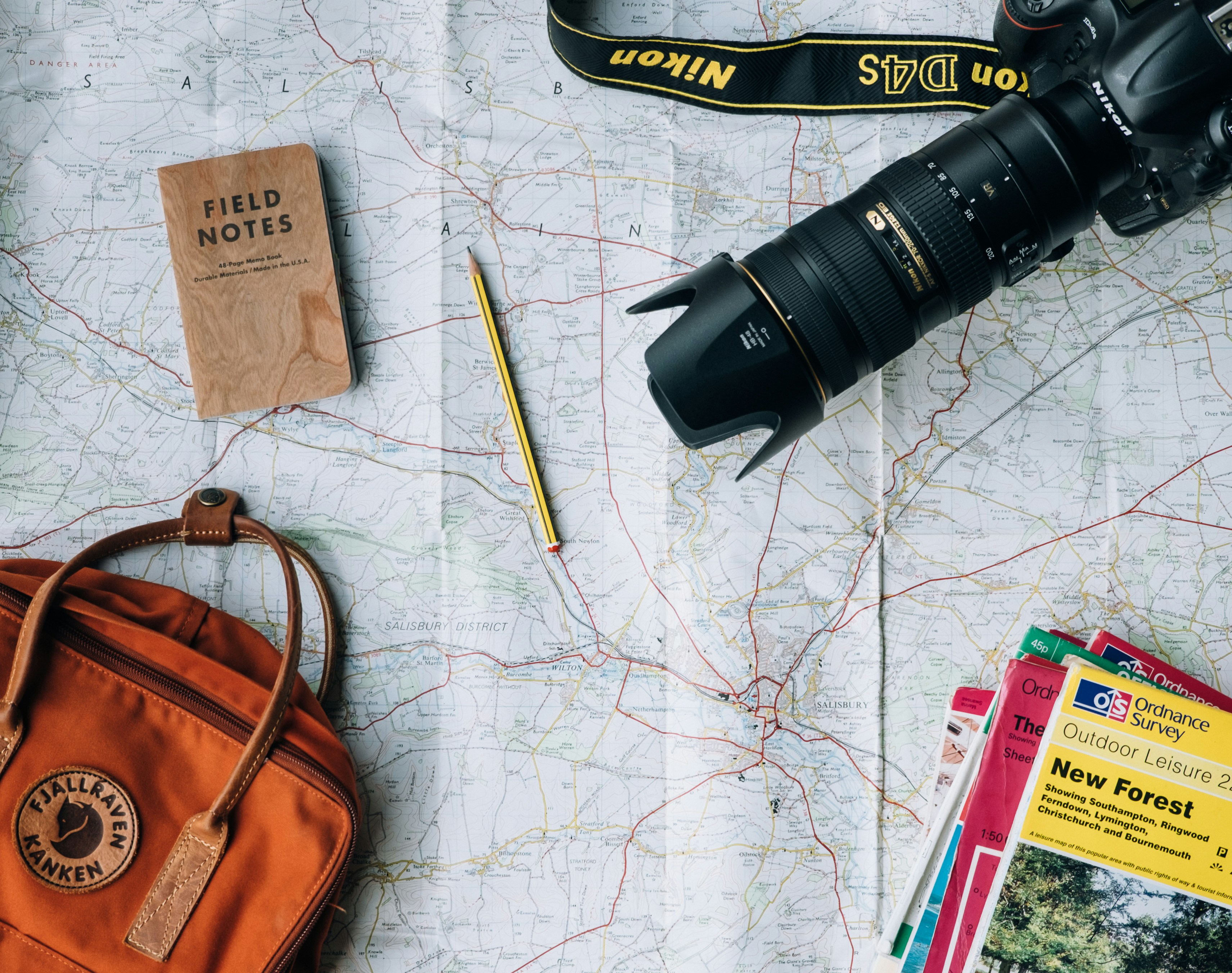 Travel planning flat lay for Sunny Escape Travel custom itinerary planning