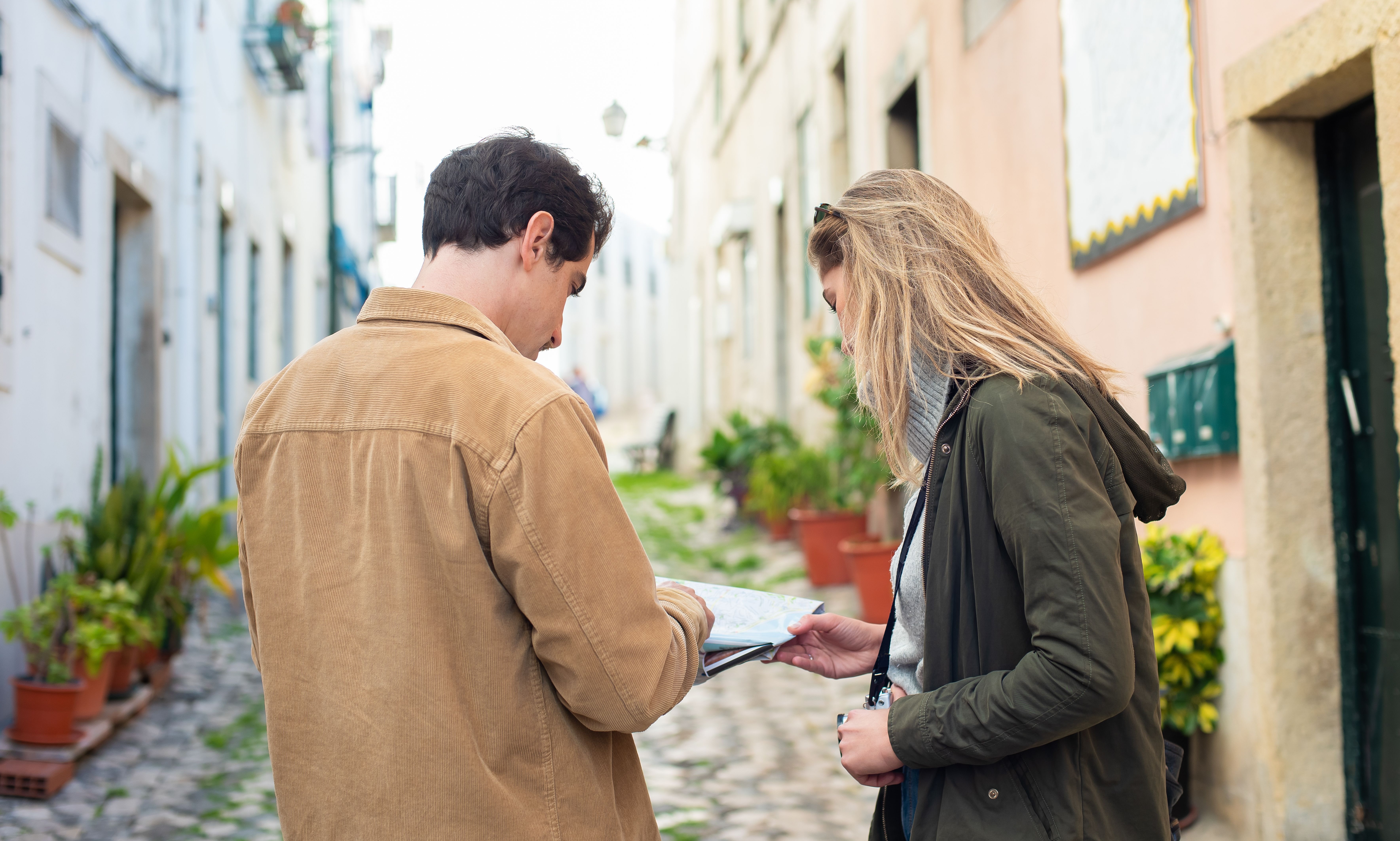 Couple on a trip planning their schedule