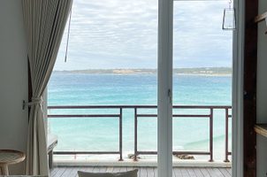 Luxury resort overlooking turquoise ocean water
