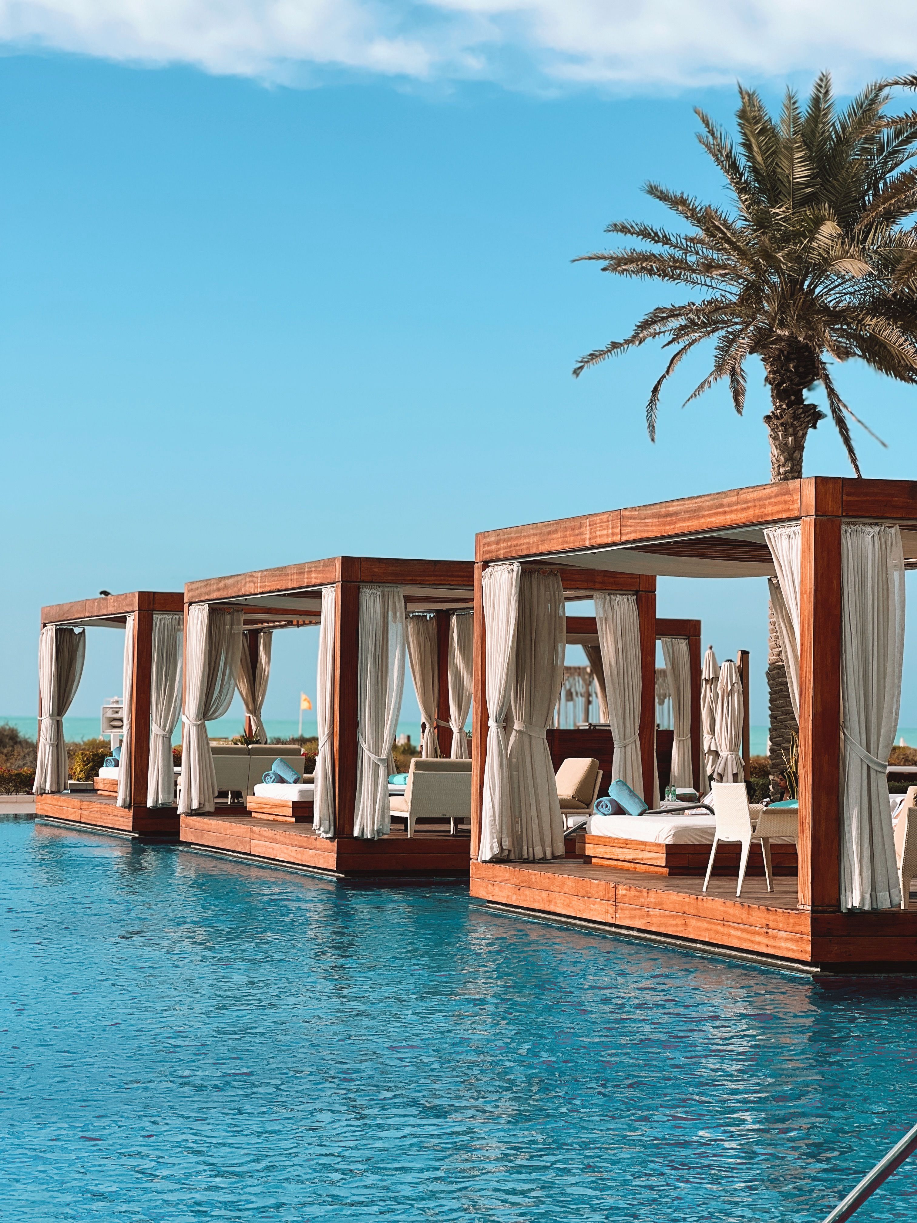 Elegant adults-only resort terrace overlooking turquoise Caribbean water