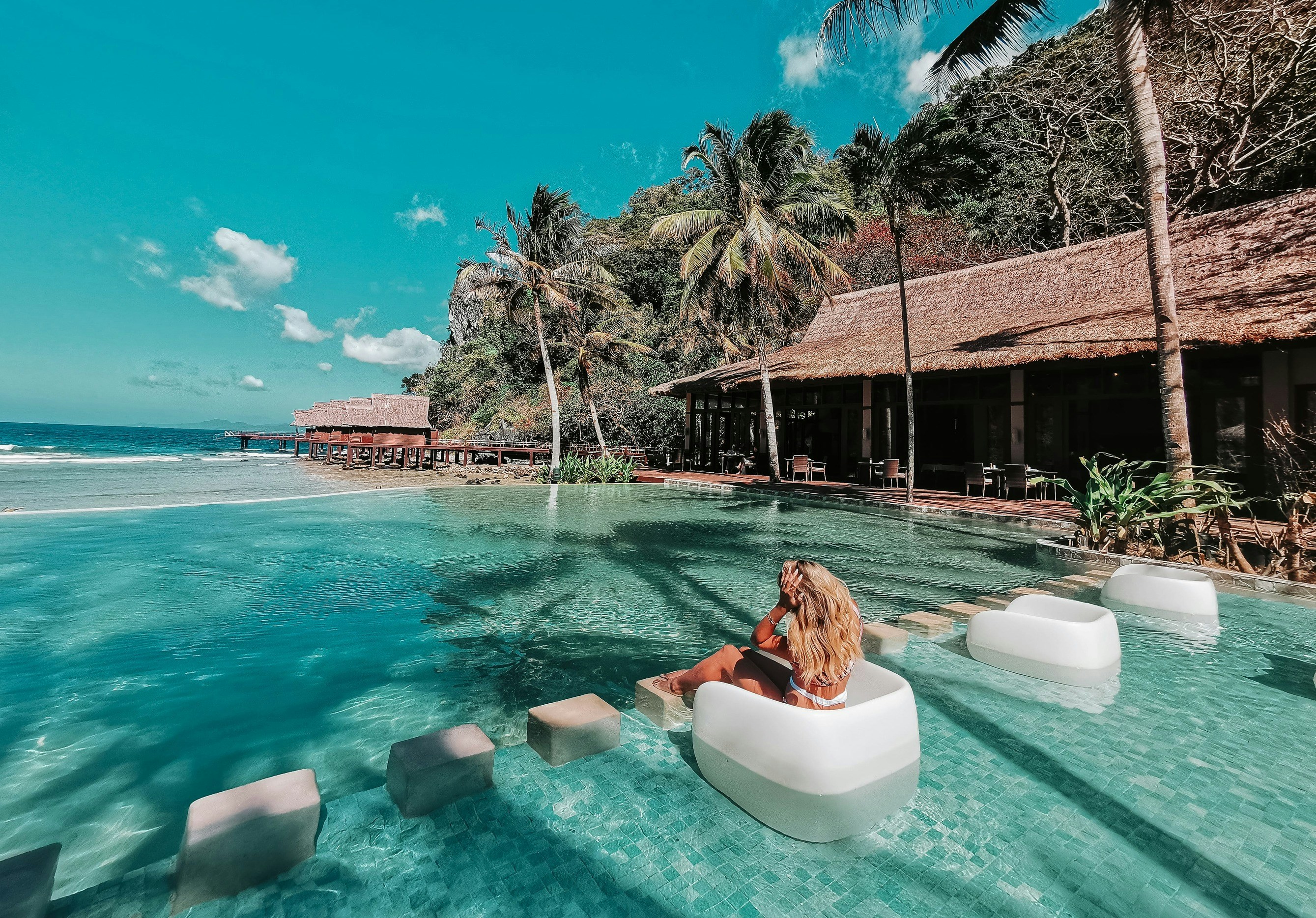 Luxury resort terrace with upscale tropical surroundings